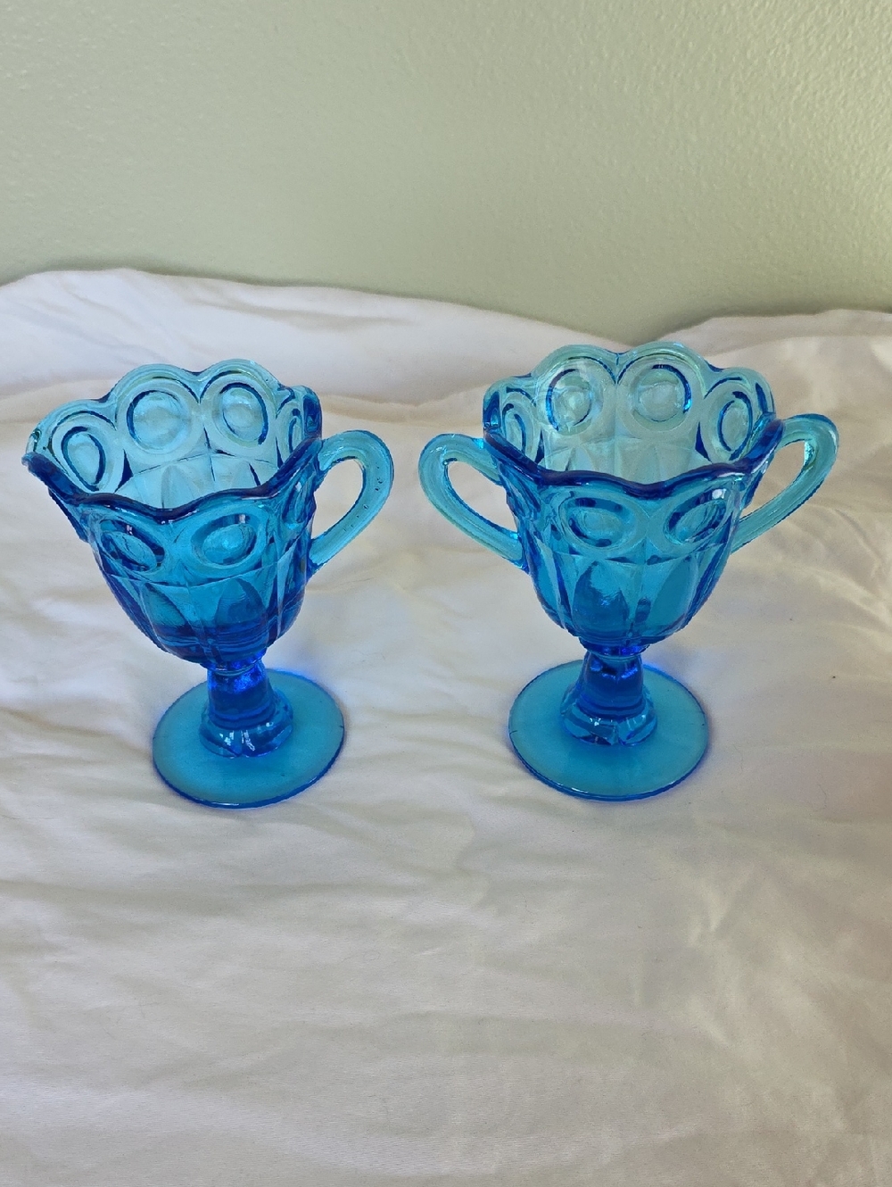 Kanawha Blue pressed glass creamer and sugar set Bull's-Eye with Prisms pattern.